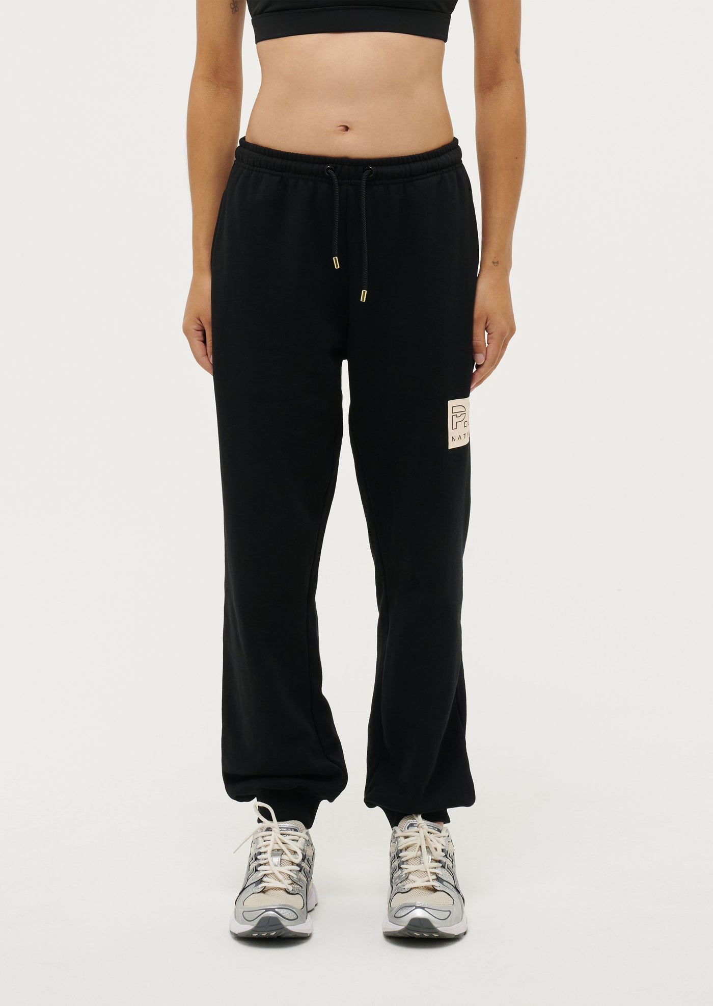 CUT SHOT TRACKPANT IN BLACK