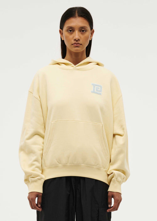 CLUB RACE HOODIE IN BUTTER