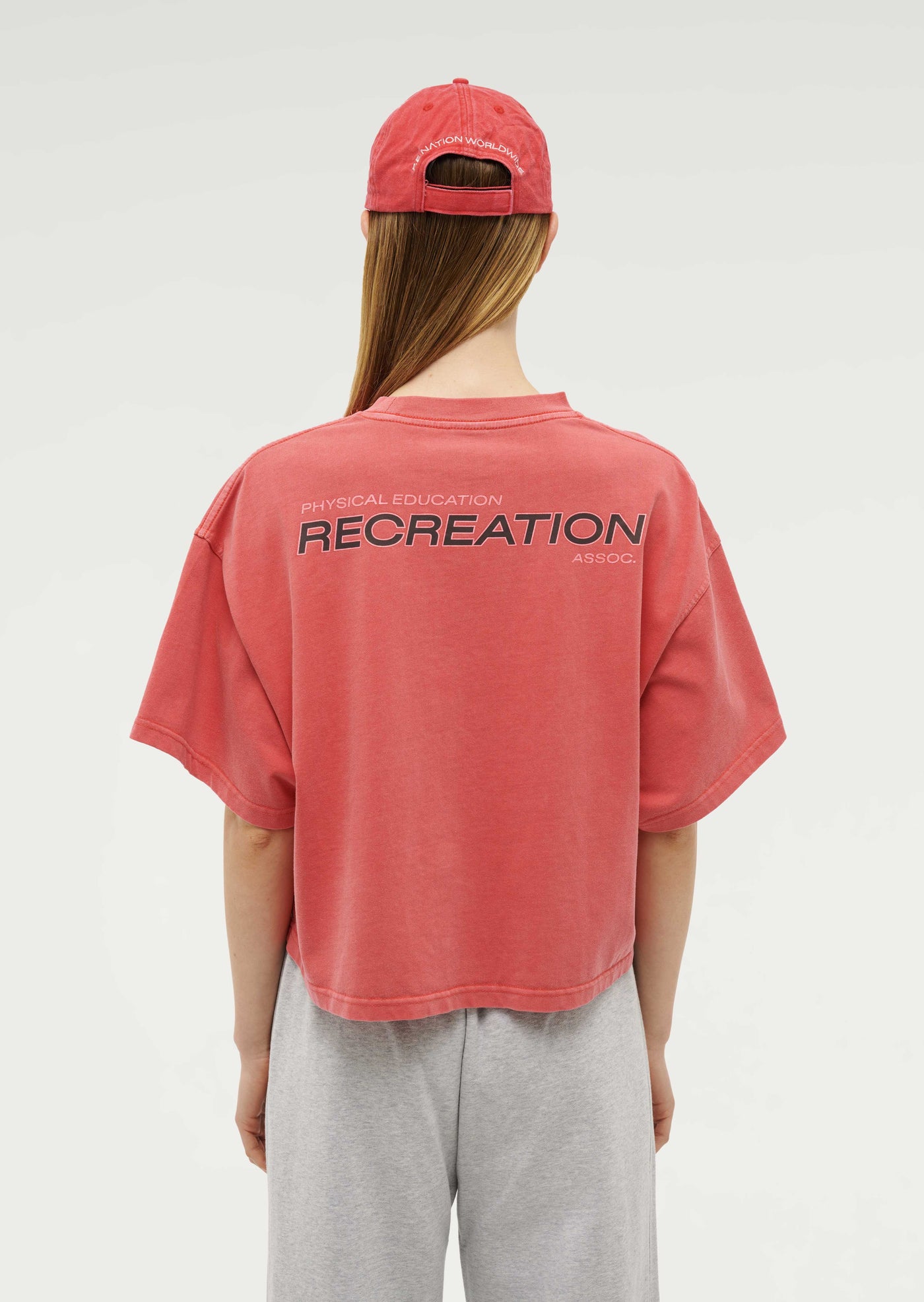 Nomad Boxy Short Sleeve Tee in Washed Poppy Red by P.E Nation, Red Womens Oversized Crop Graphic Tee