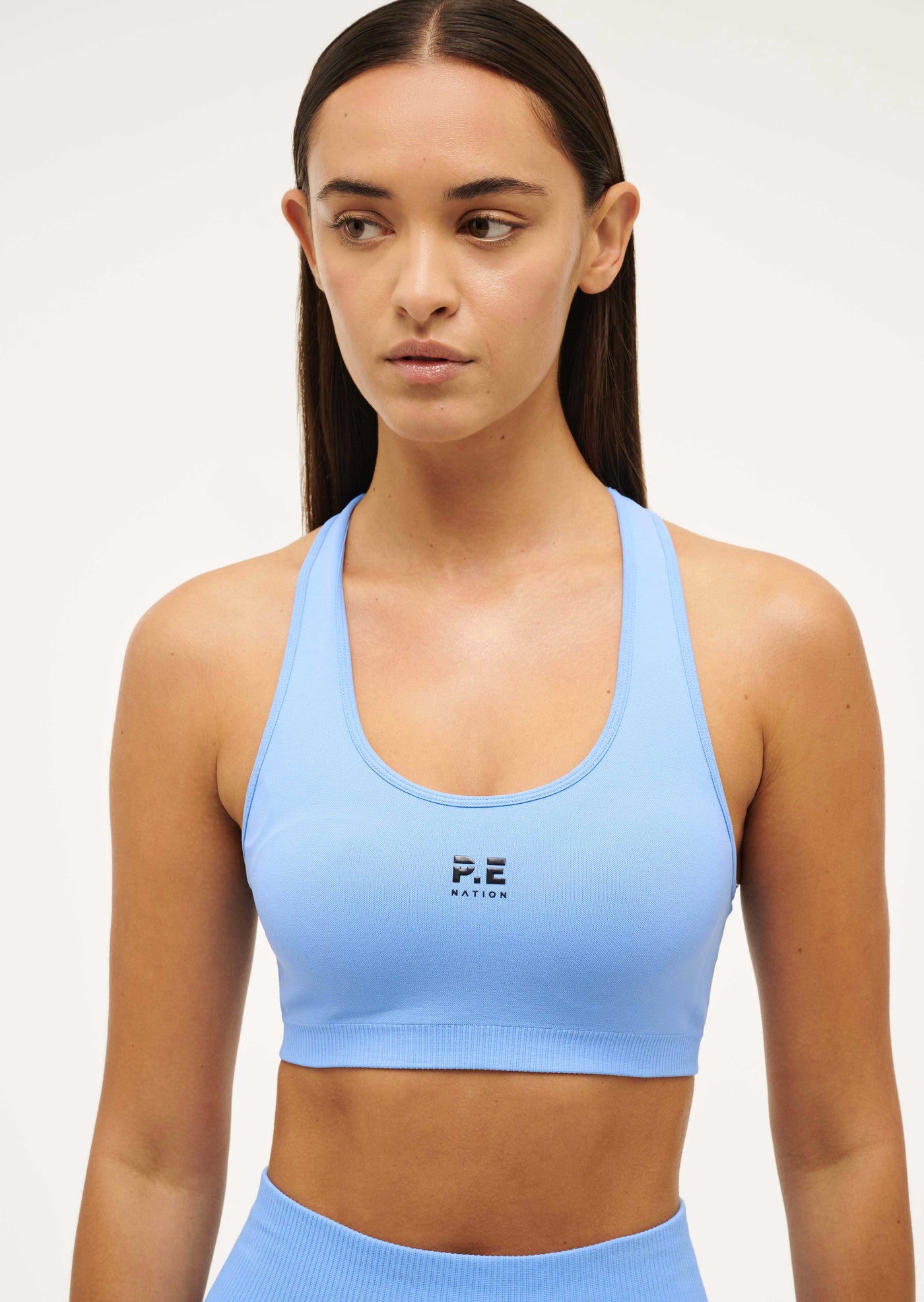 RESTORE SEAMLESS SPORTS BRA IN CORNFLOWER BLUE