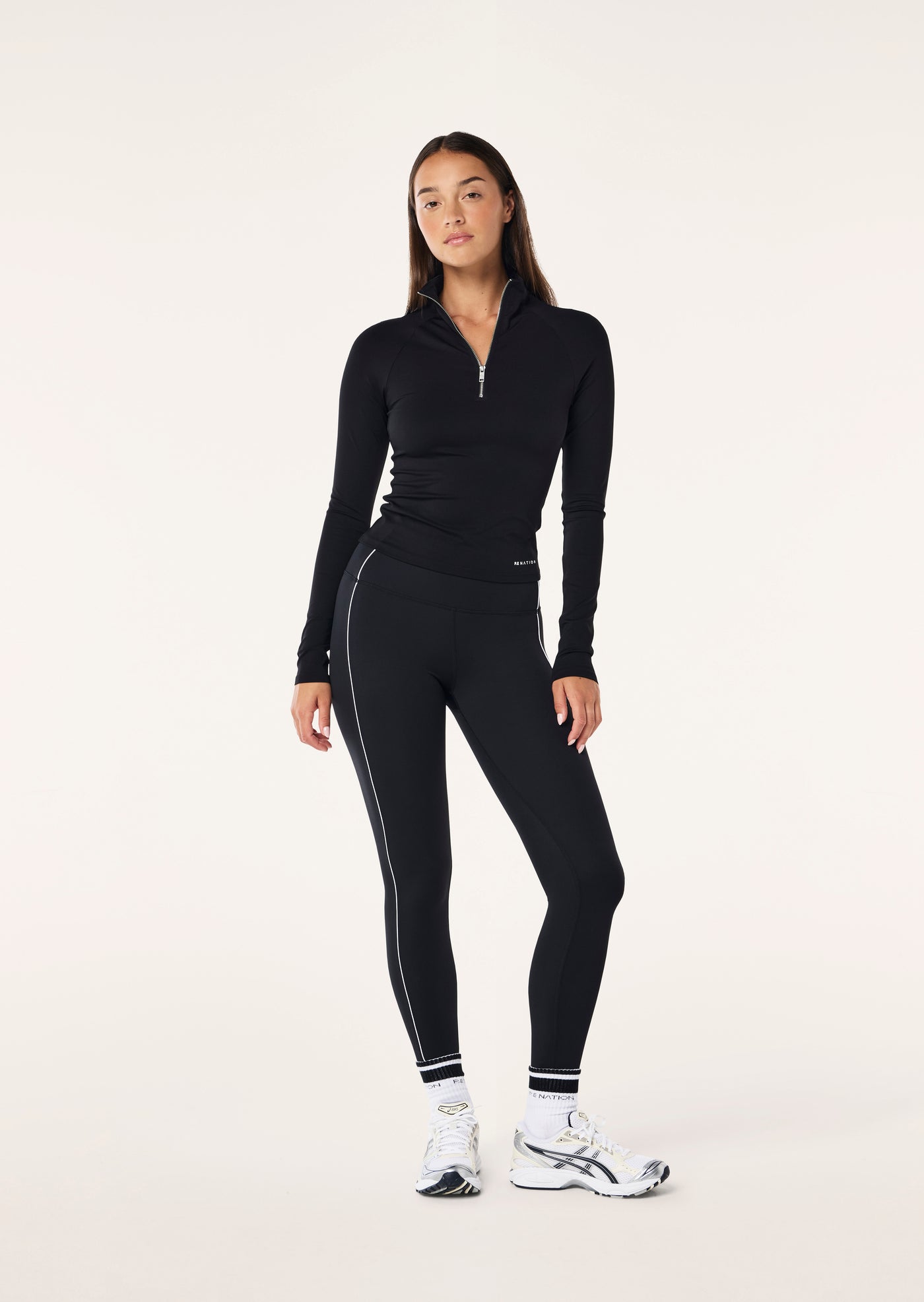 ROUTINE QUARTER ZIP LONG SLEEVE TOP IN BLACK