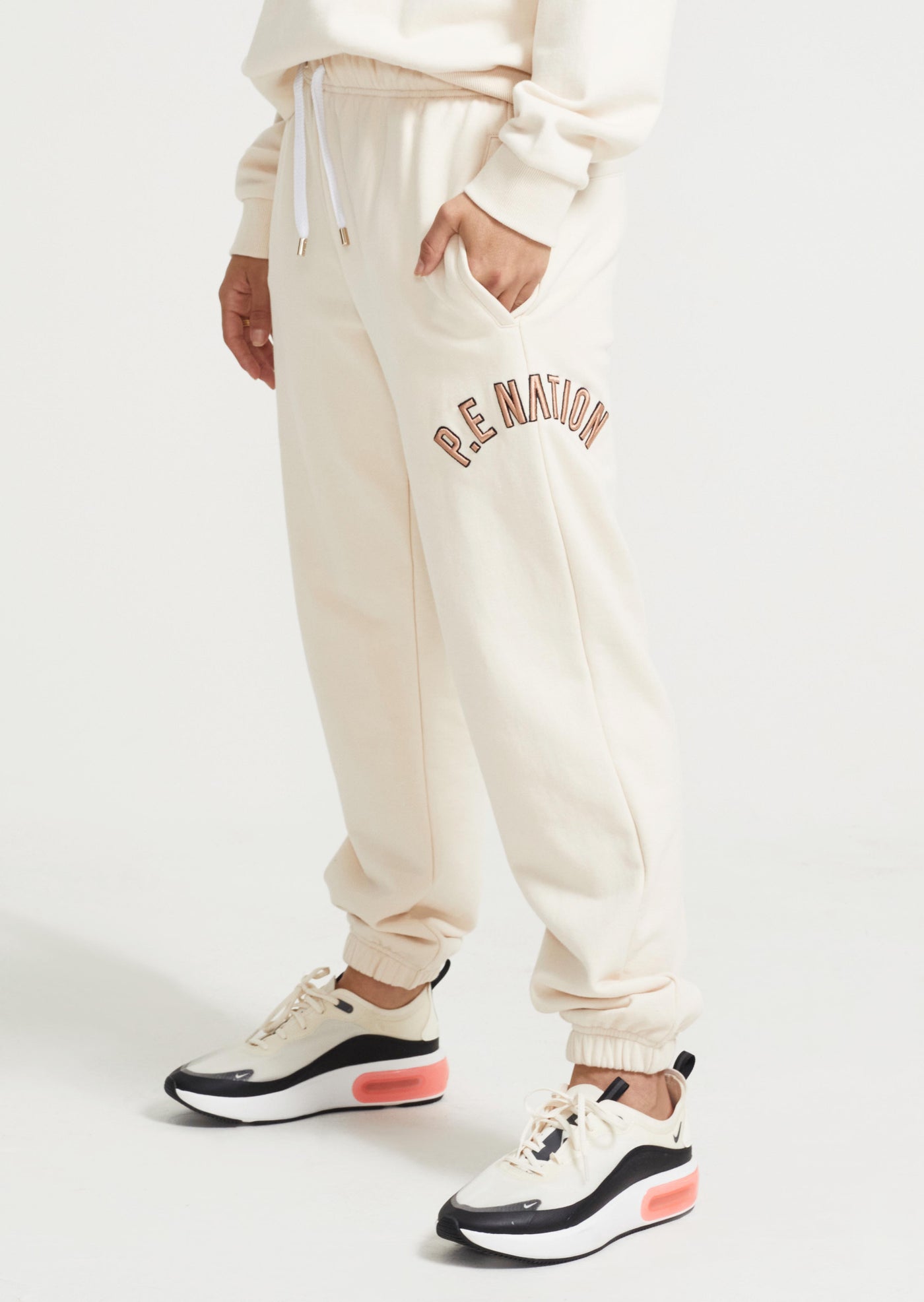 DROP SHOT TRACK PANT IN IVORY P.E Nation International