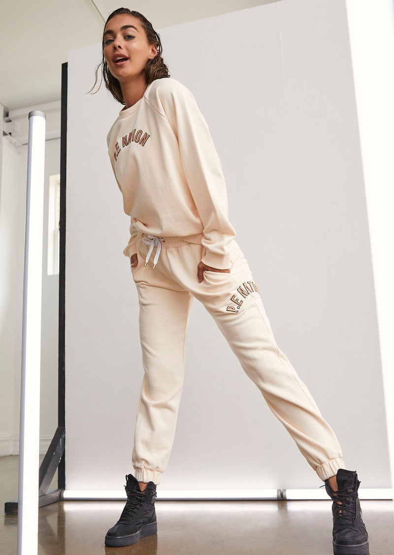 DROP SHOT TRACK PANT IN IVORY