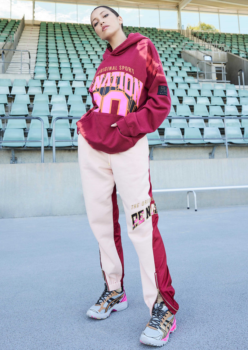 DOUBLE UNDER TRACKPANT IN CANDY