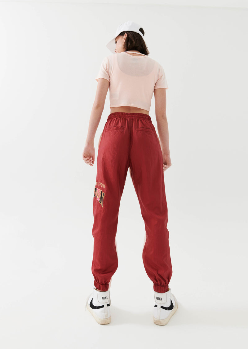 DOUBLE UNDER TRACKPANT IN CANDY
