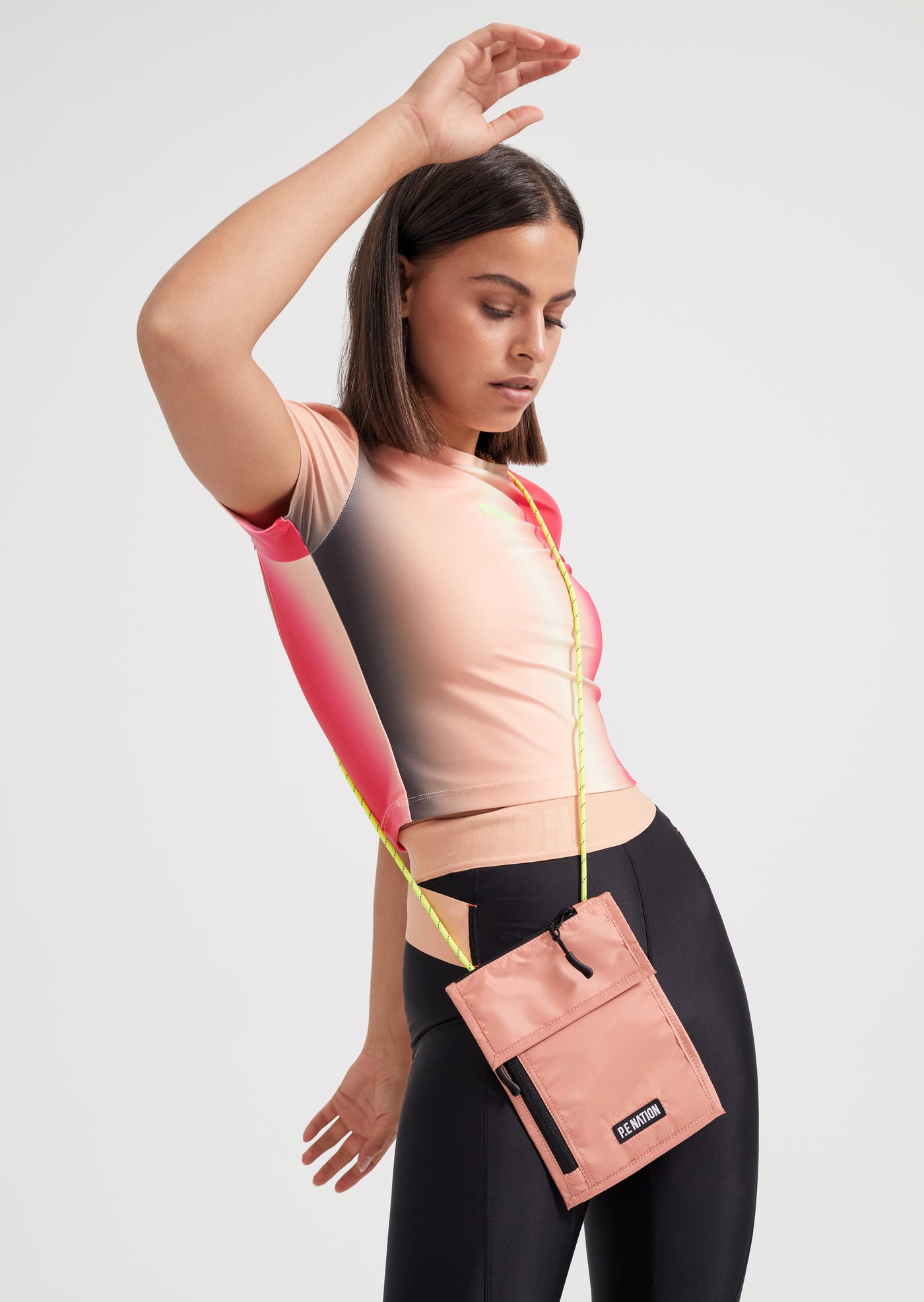 QUALIFIER LOGO POUCH IN PEACH BLOOM